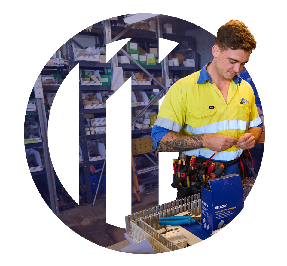 MECS Electrical & Controls team member doing service maintenance onsite
