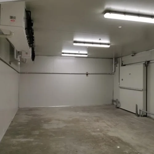 Install a comprehensive refrigeration system for the new Farmer Jack's supermarket