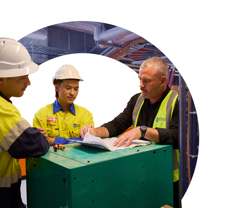 Mecs Electrical & Controls Team having a discussion on a repair strategy for a project