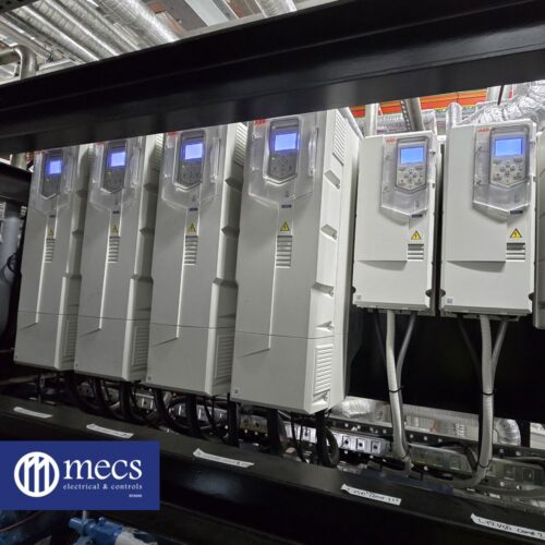 Electrical equipment and tools neatly arranged in an industrial setting for electrical and BMS CONTROLS maintenance and operations