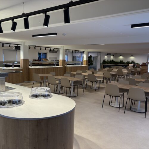 Spacious kitchen with tables and chairs at Whaleback and Kalgan Dry Mess Facilities after electrical upgrade by an electrical mechanic