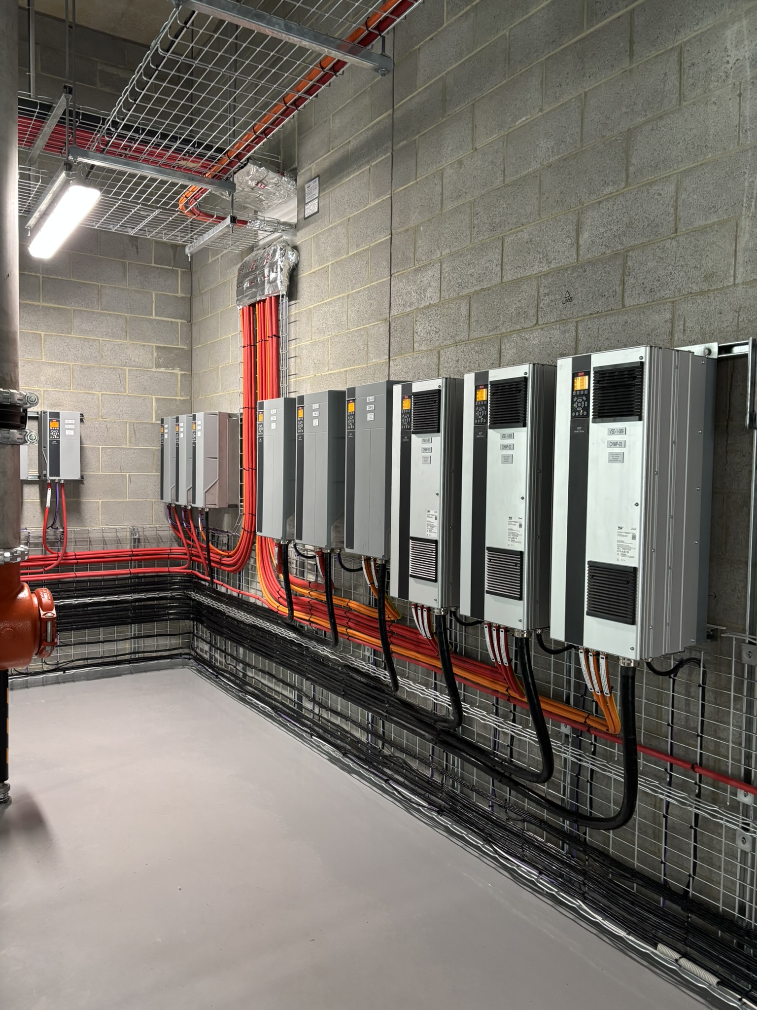 Interior view of room with mechanical services switchboards and electrical devices installed by MECS electrical mechanic team in operation at Perth Hospital