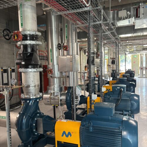 Multiple pumps and valves at Perth Hospital industrial system installed by MECS electrical mechanic for mechanical electrical works